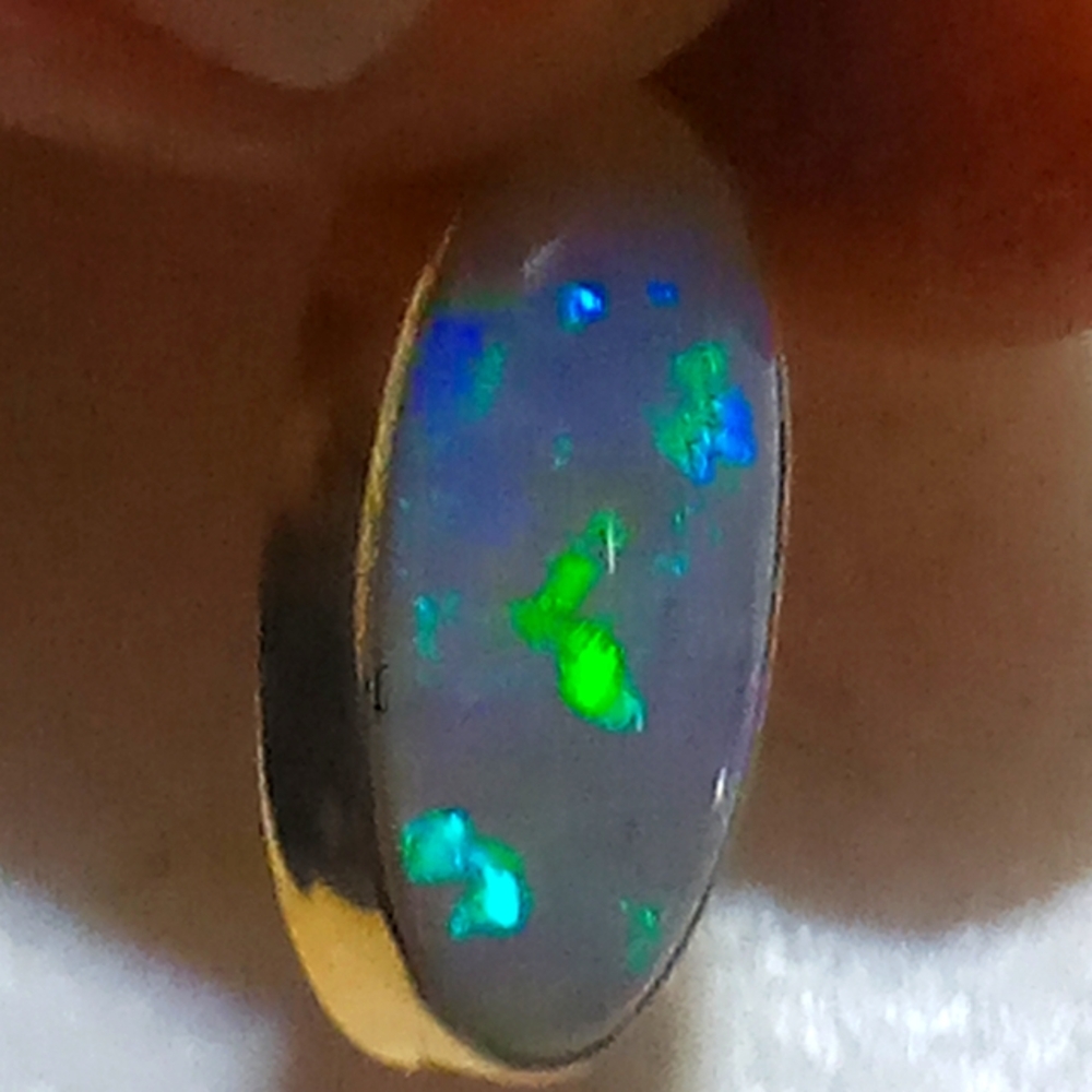 Elegant Black Opal pendant purple hue